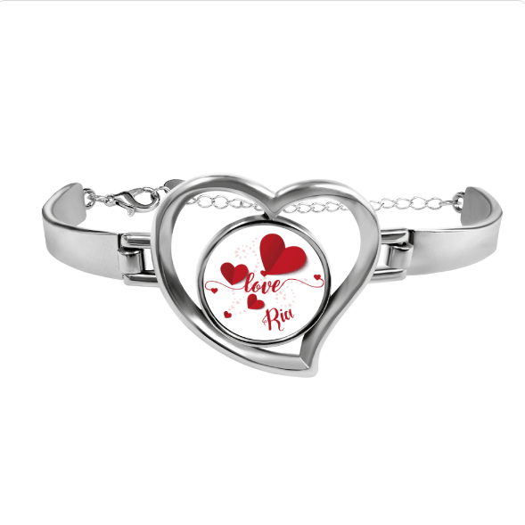 Heart charm bracelet with silver heart locket and red heart design reading "Love Rid"