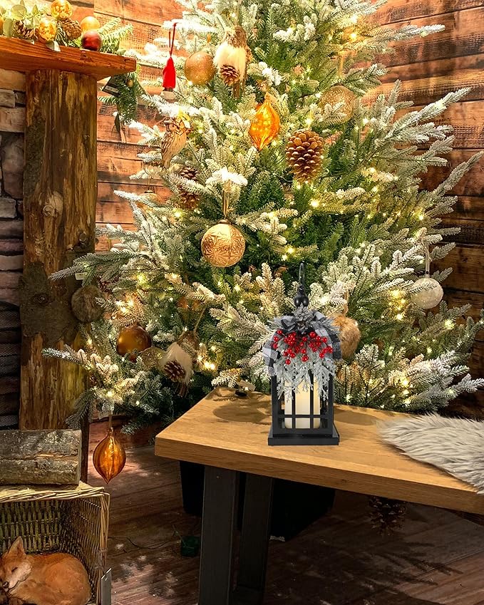Black metal Christmas lantern with faux flameless candle and red-and-silver wreath centerpiece