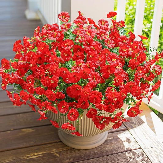 Red faux morning glory flower bundles in a ribbed cream planter, full blooms