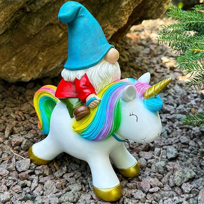 Side view unicorn figurine with rainbow mane, blue gnome hat, and red shirt