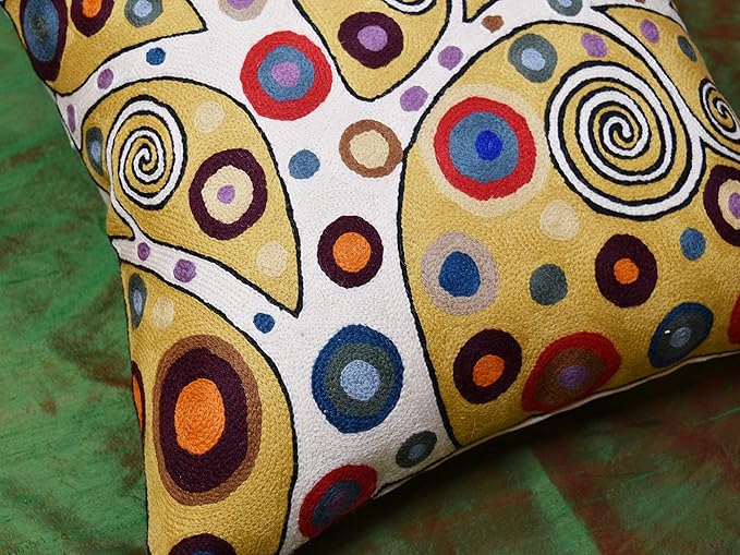 Decorative embroidered pillow cover, yellow with multicolor circular swirl accents