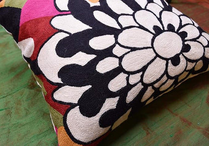 Embroidered flower pillow cover with bold white petals and black flower center