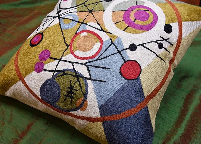 Wool throw pillow cover angled view with multiple abstract circles and colorful dots.