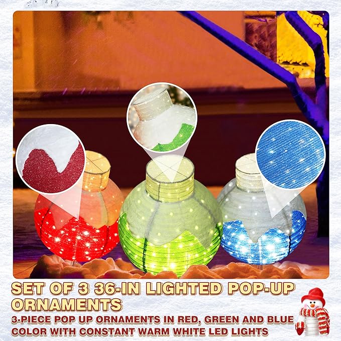 Set of 3 lit pop-up Christmas ball ornaments in green, blue and red with glitter