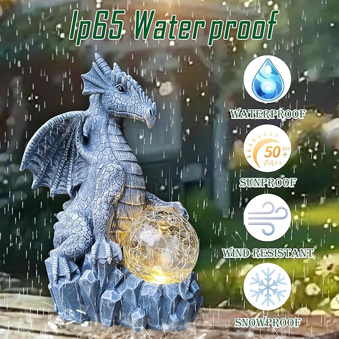 Blue dragon solar statue with glowing orb and jagged stone base in rainy conditions