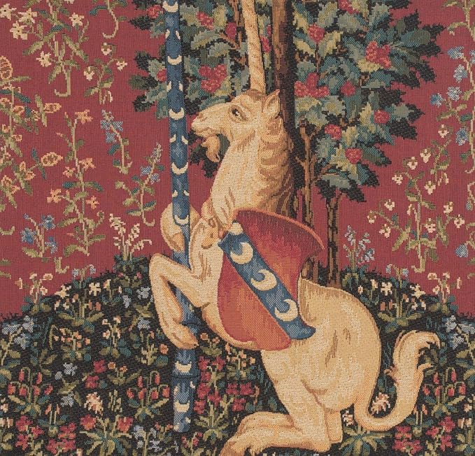 Close-up unicorn tapestry pillow cover with burgundy, blue, and green floral background