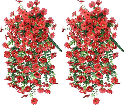 Pair of red faux hanging flower bundles with cascading red blooms and green foliage