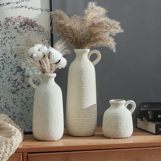 Set of 3 white ceramic vases with loop handles, textured glaze with three vase sizes
