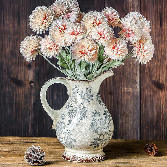 Ceramic blue floral pitcher vase with curved handle and spout, crackle glaze, floral bouquet