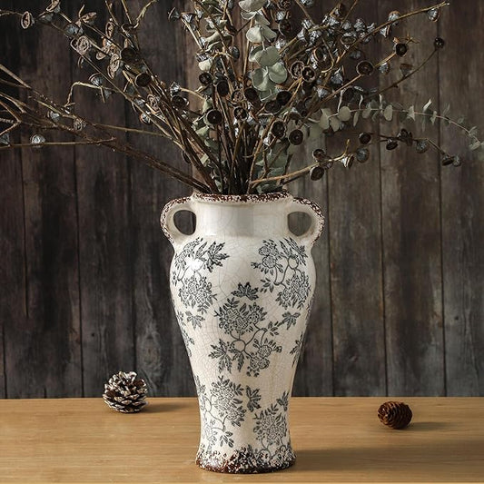 Blue-and-white ceramic vase with double handles and floral chinoiserie pattern