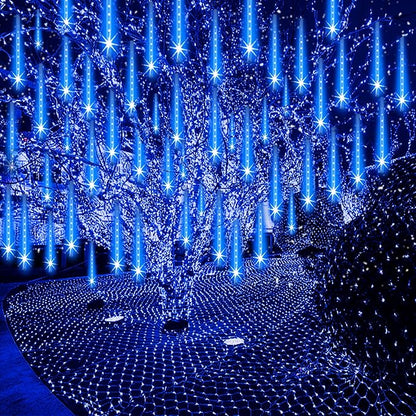 Blue LED hanging icicle curtain lights creating a falling snow effect walkway