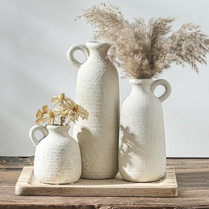 Set of 3 white ceramic vases with loop handles, tall textured shapes for dried stems