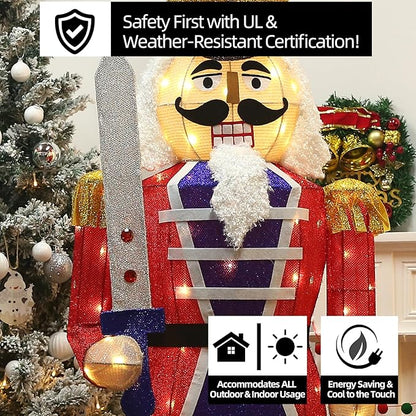 Close-up lighted nutcracker decor with red coat, blue sash, white beard, and warm LEDs