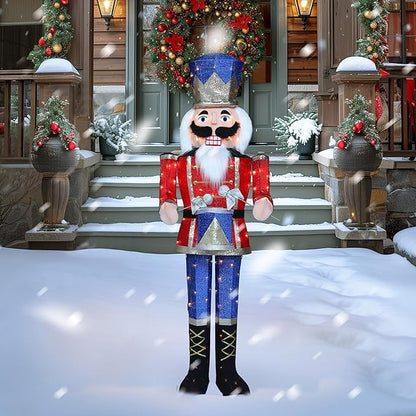 Pre-lit nutcracker soldier decoration with blue hat, red coat, blue pants, warm white lights