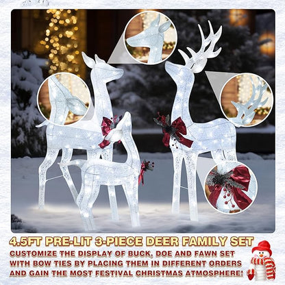 Pre-lit white glitter reindeer family set with three deer and red bows, lit display