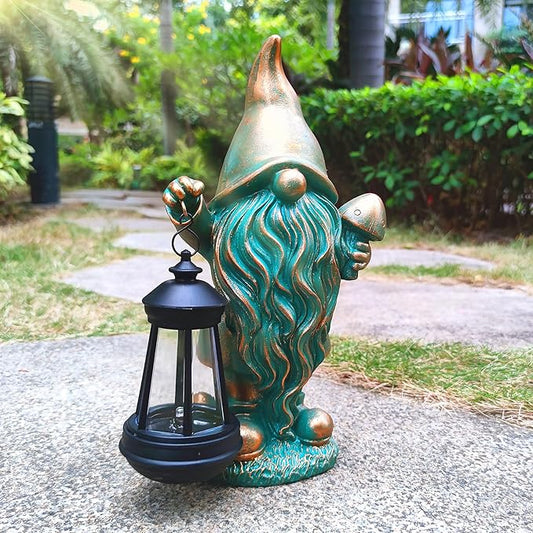Bronze gnome solar lantern ornament holding lantern light in outdoor yard