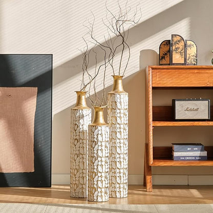 Set of three twig-pattern metal floor vases in antique white with gold tops