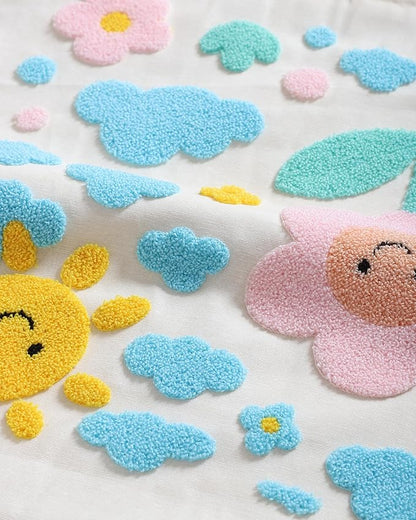 Handmade cotton throw pillow cover with scattered clouds, flowers, and sun accents