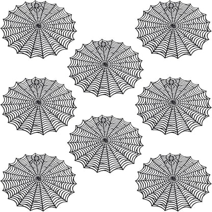 Set of round black spider web PVC table placemats with bold radial web pattern