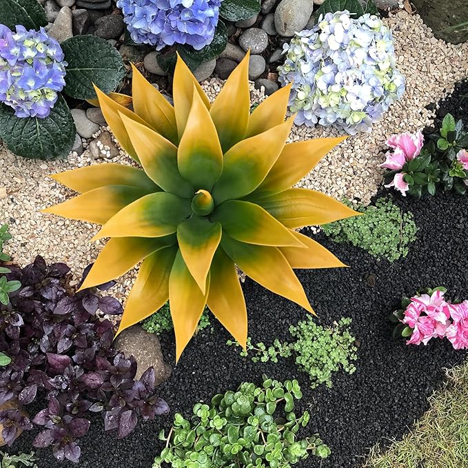 Yellow-green faux agave plant with spiky layered leaves and textured faux trunk
