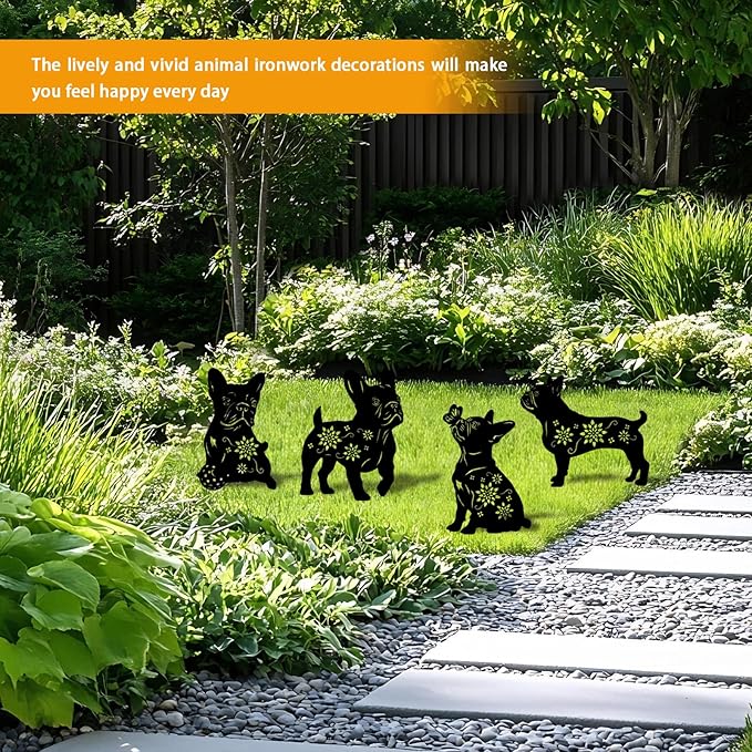 Set of 4 black metal dog silhouette garden stakes with floral cutout motifs