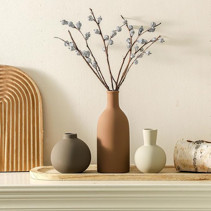 Set of 3 matte ceramic vases, including tall terracotta and two smaller bottle shapes