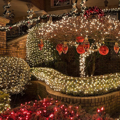 Warm white mini LED fairy string lights with green wire, outdoor arch and curtain effect