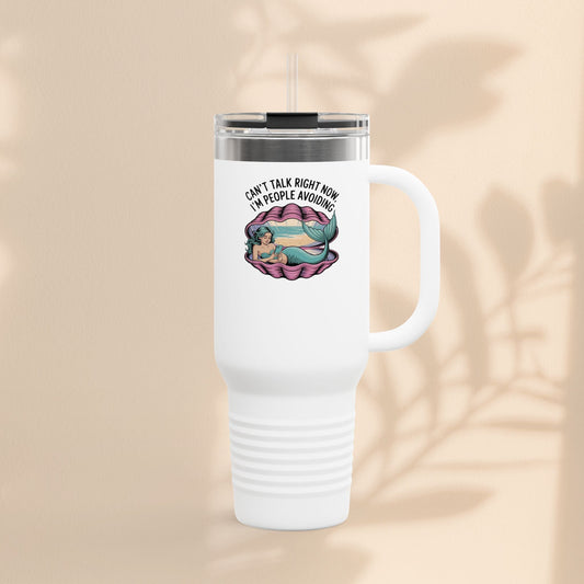 White insulated travel mug with lid and straw, front introvert slogan graphic