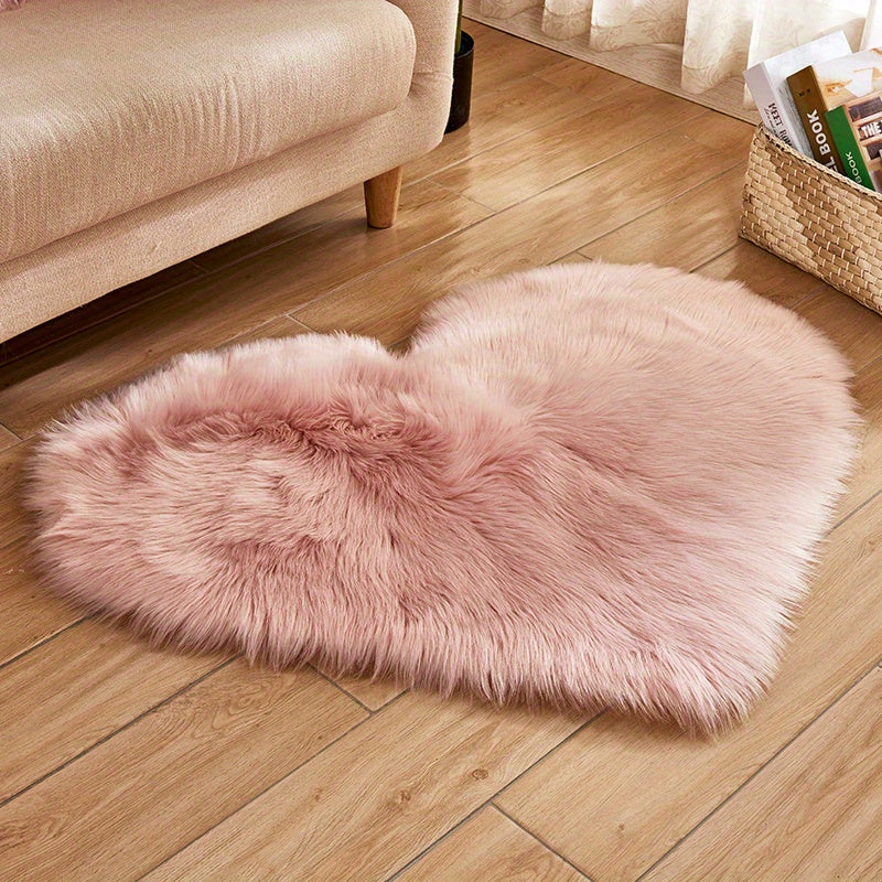 Pale pink plush heart-shaped area rug with soft shag pile for indoor rooms