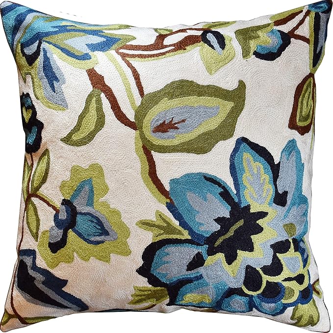 Floral decorative pillow cover in cream with blue and green flower needlepoint design