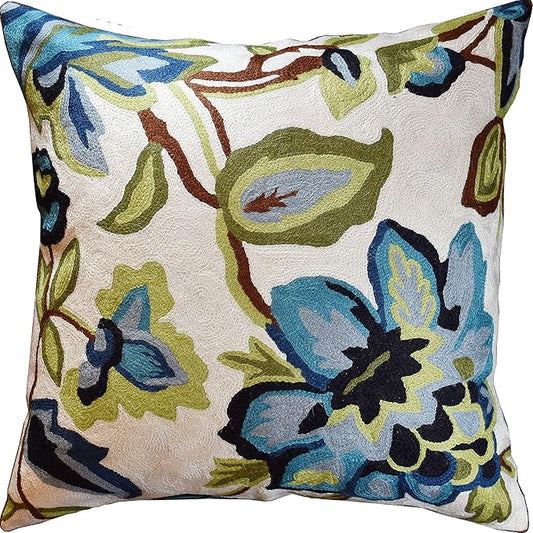 Floral decorative pillow cover in cream with blue and green flower needlepoint design