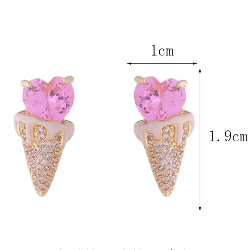 Pink heart top and gold-tone triangular glitter earrings with size markings, pair