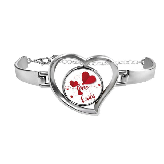 Heart charm bracelet with silver clasp and red heart locket reading "Love Emily"