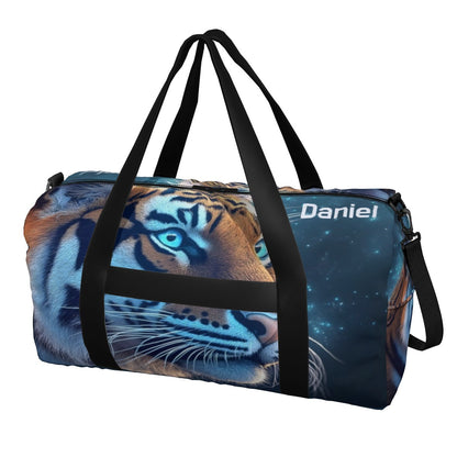 Blue duffel bag with tiger face print, Daniel logo panel, black shoulder strap.