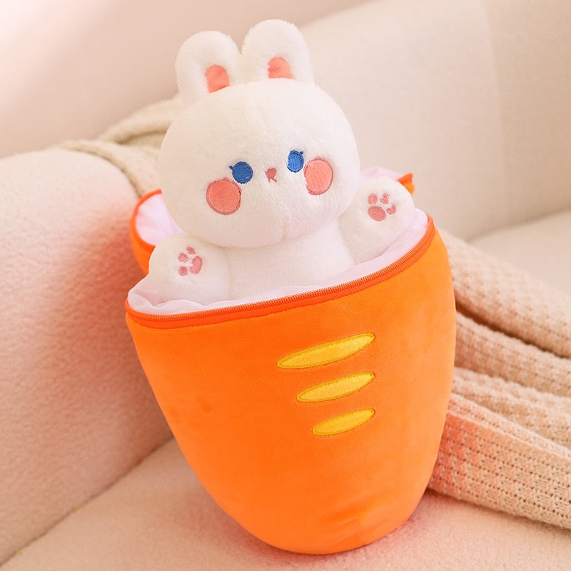 Carrot-shaped plush animal, orange pod with zipper and white bunny face with blue eyes