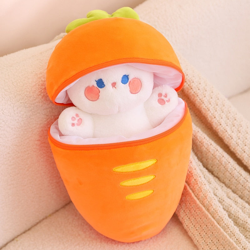 Orange carrot pod plush with zipper opening, showing white bunny inside with embroidered face