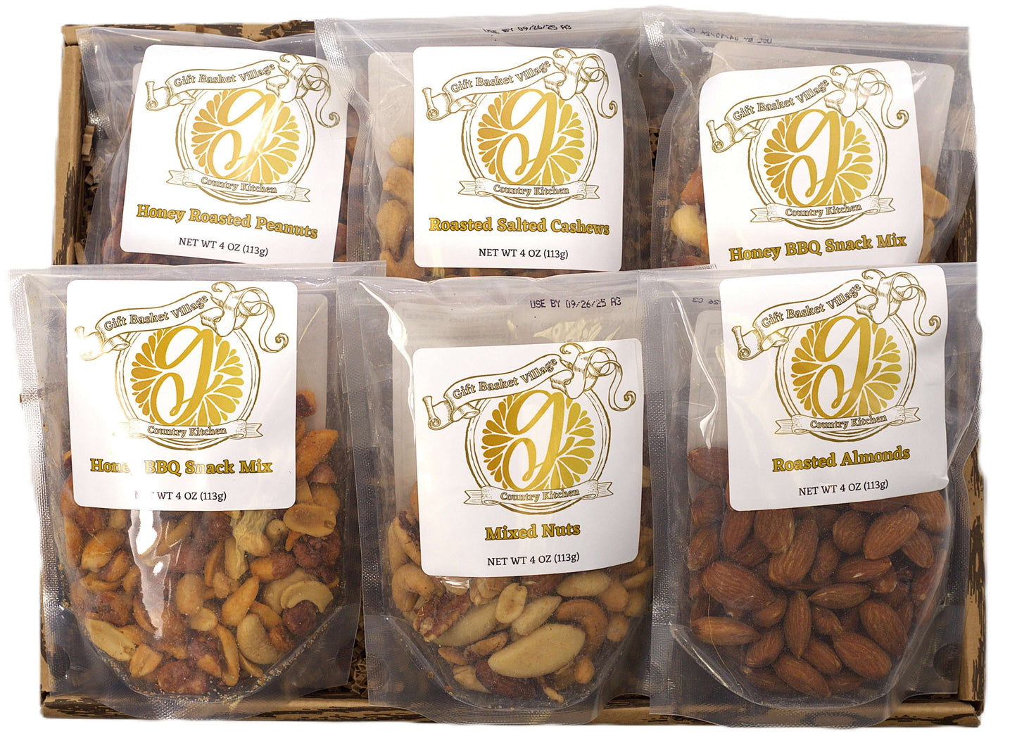 Nut gift box with six clear pouches of roasted nuts in cardboard tray