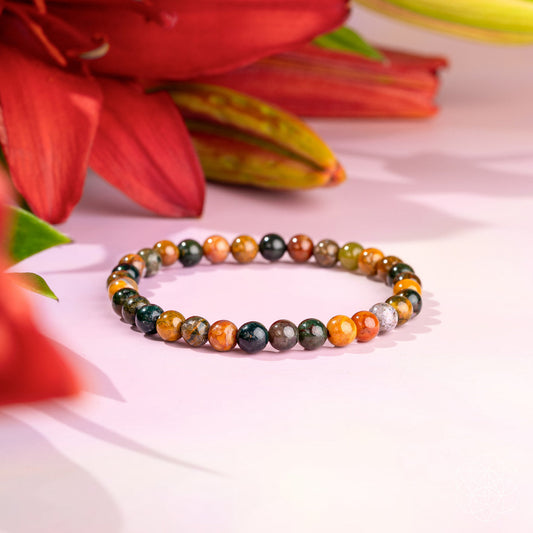 Ocean jasper beaded bracelet with multicolor round stones and elastic stretch fit.