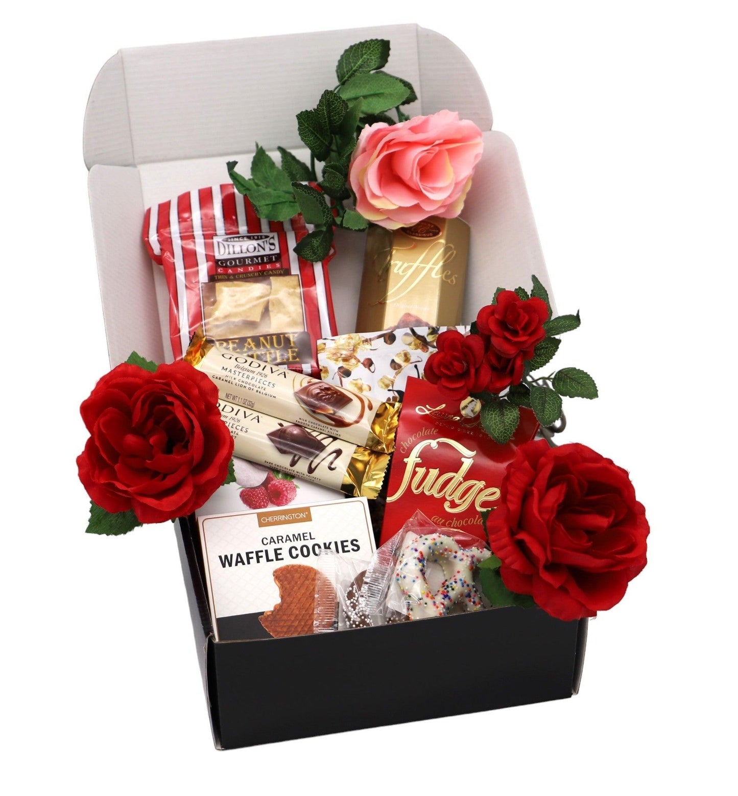 Valentine gift box with black base, packaged treats, and red roses with a pink rose