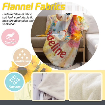 Flannel unicorn blanket with rainbow mane and name Adeline, fabric close-up