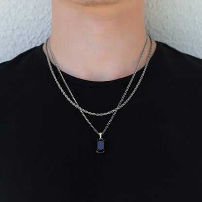 Silver-tone onyx pendant necklace set with dark rectangular stone charm
