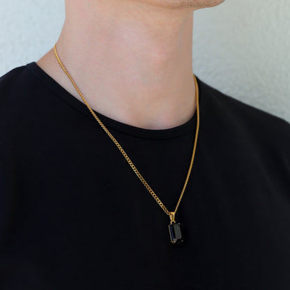 Gold-tone onyx stone pendant necklace set with long chain and rectangular charm