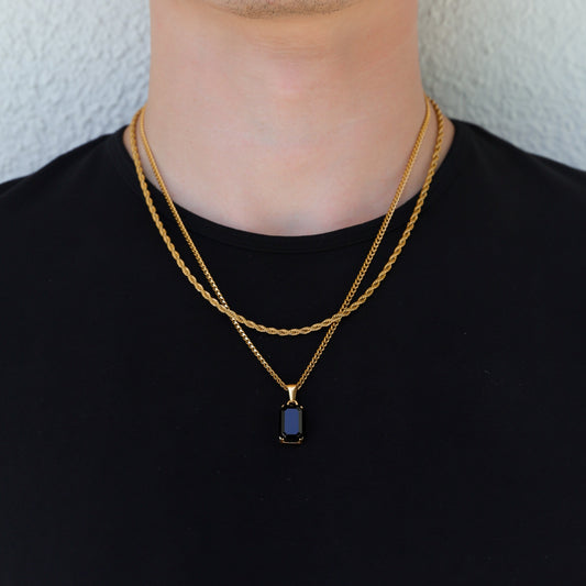 Gold-tone onyx stone pendant necklace set with two layered chains and pendant