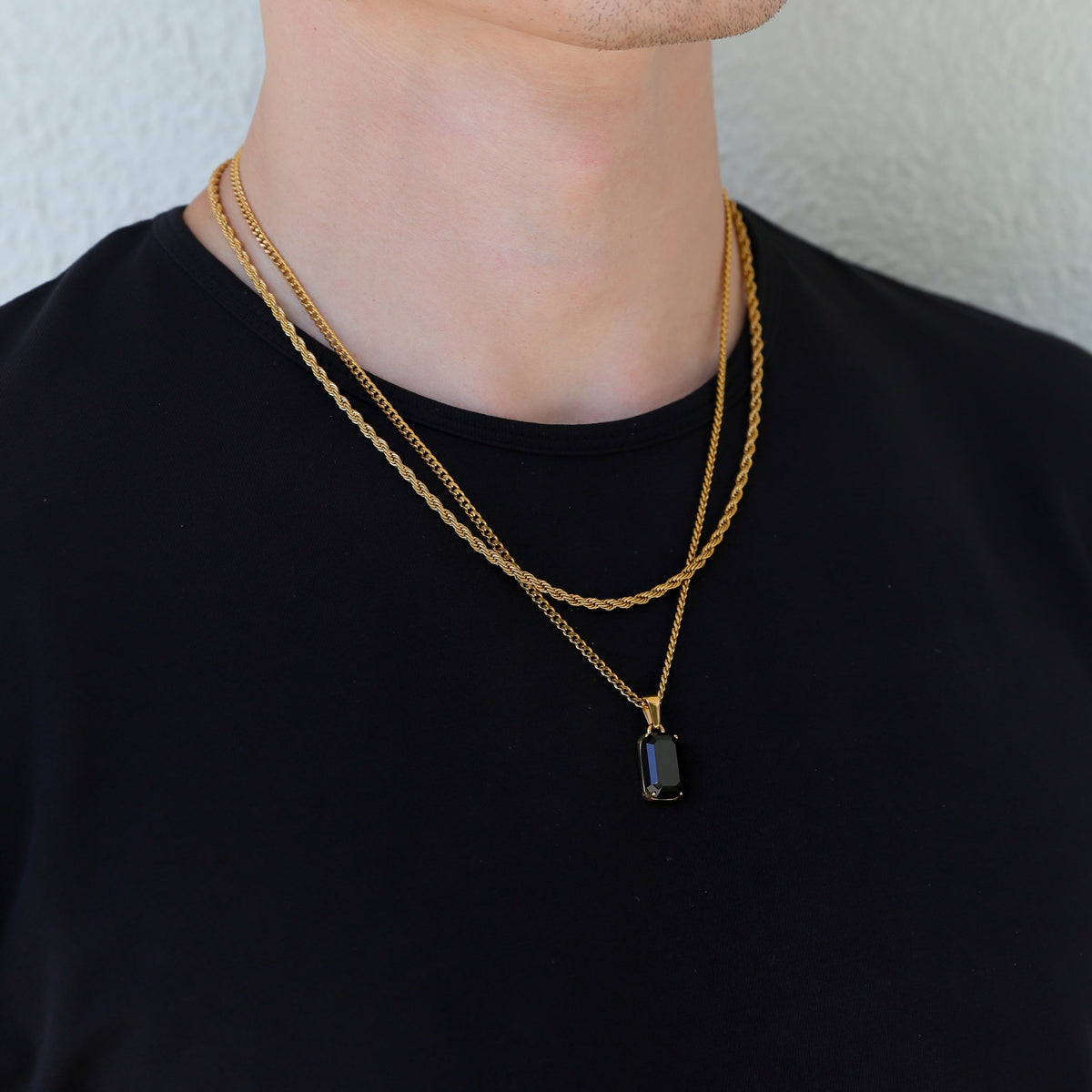 Gold-tone onyx stone pendant necklace set with two layered chains
