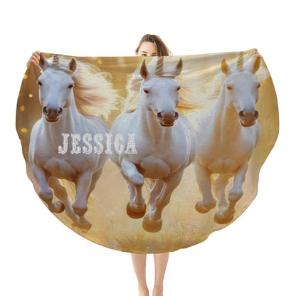 Round unicorn blanket with three white unicorns and name Jessica on golden background