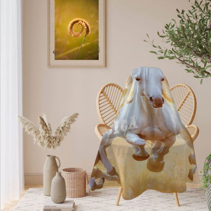 Round unicorn blanket with white unicorn graphic and name Jessica on gold beige