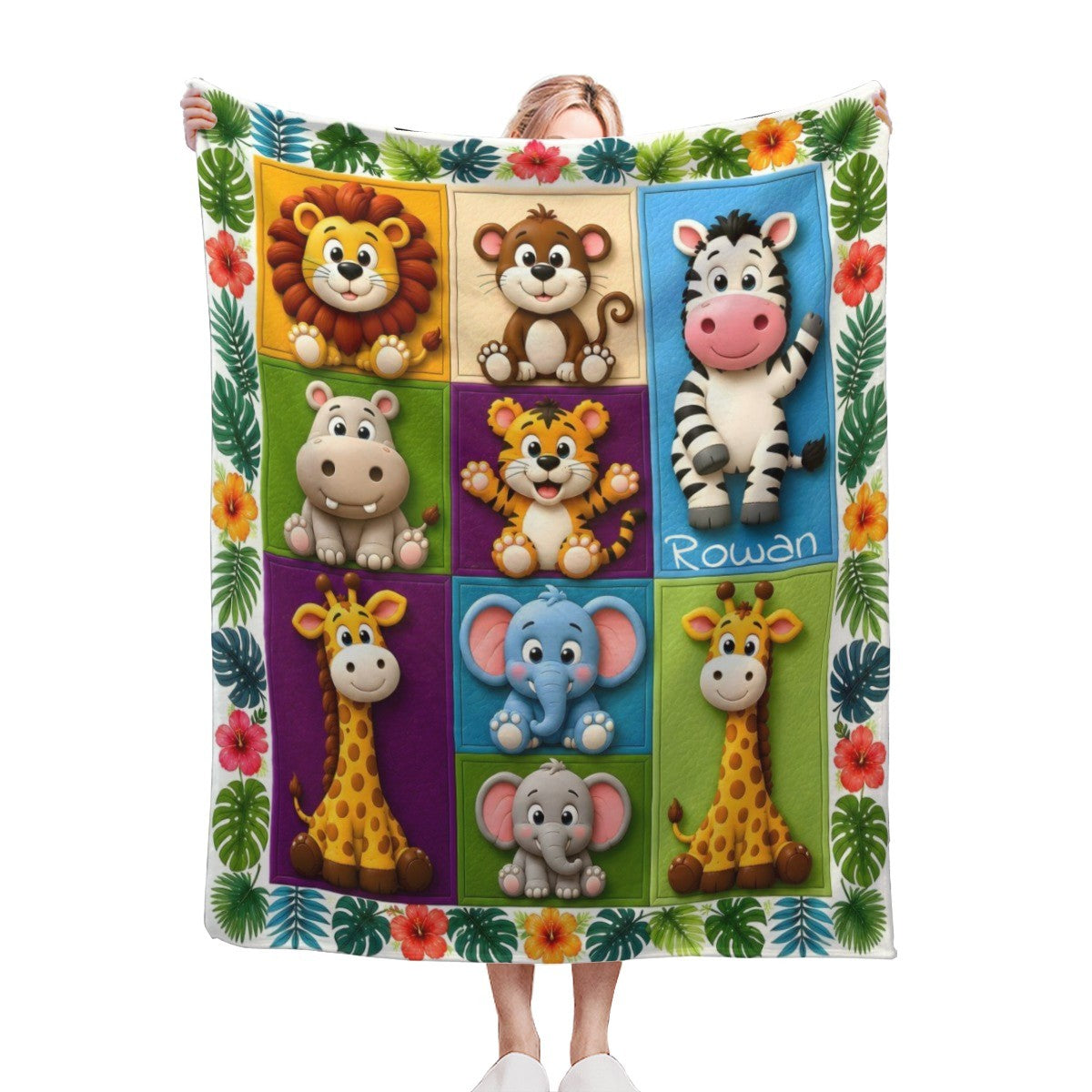 Kids blanket with square safari animal blocks and floral leaf border, with name "Rowan".