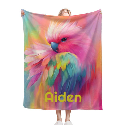 Personalized parrot name blanket with rainbow bird graphic and yellow text