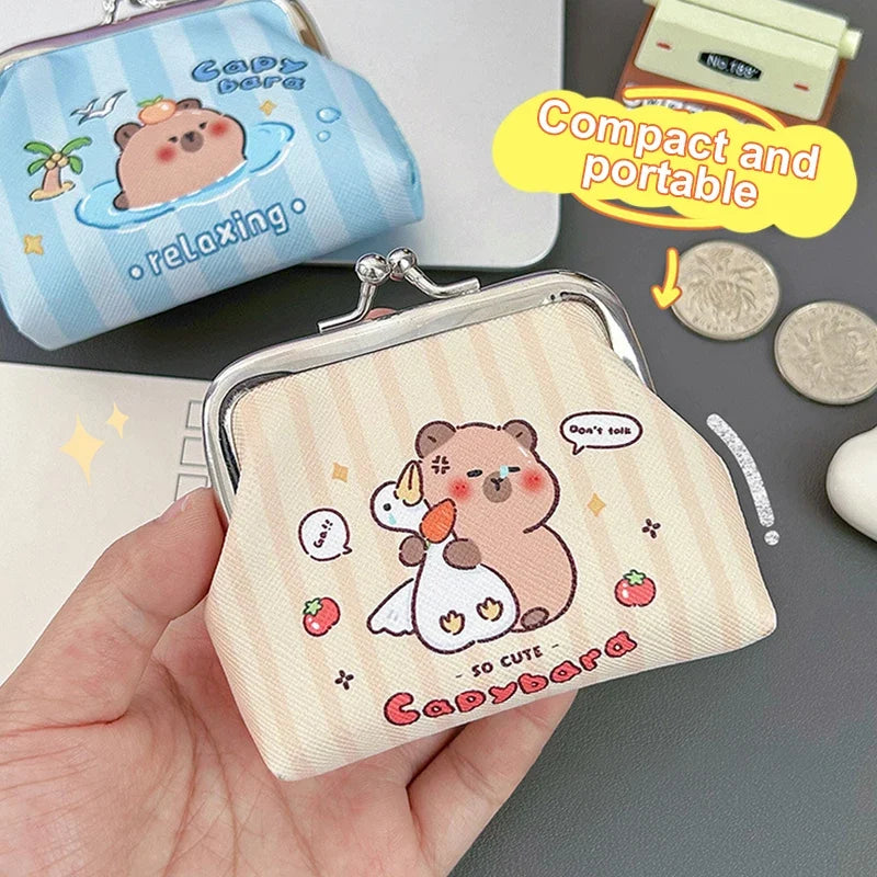 Beige striped capybara coin purse with kiss-lock metal clasp and cartoon bear graphic