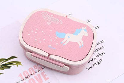 Pink unicorn bento lunch box with starry lid and unicorn illustration